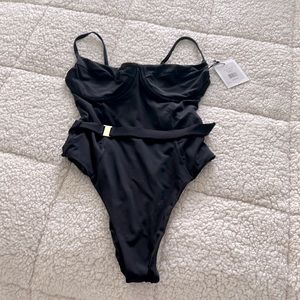 Never worn brand new tags still on black bathing suit with under wire belt